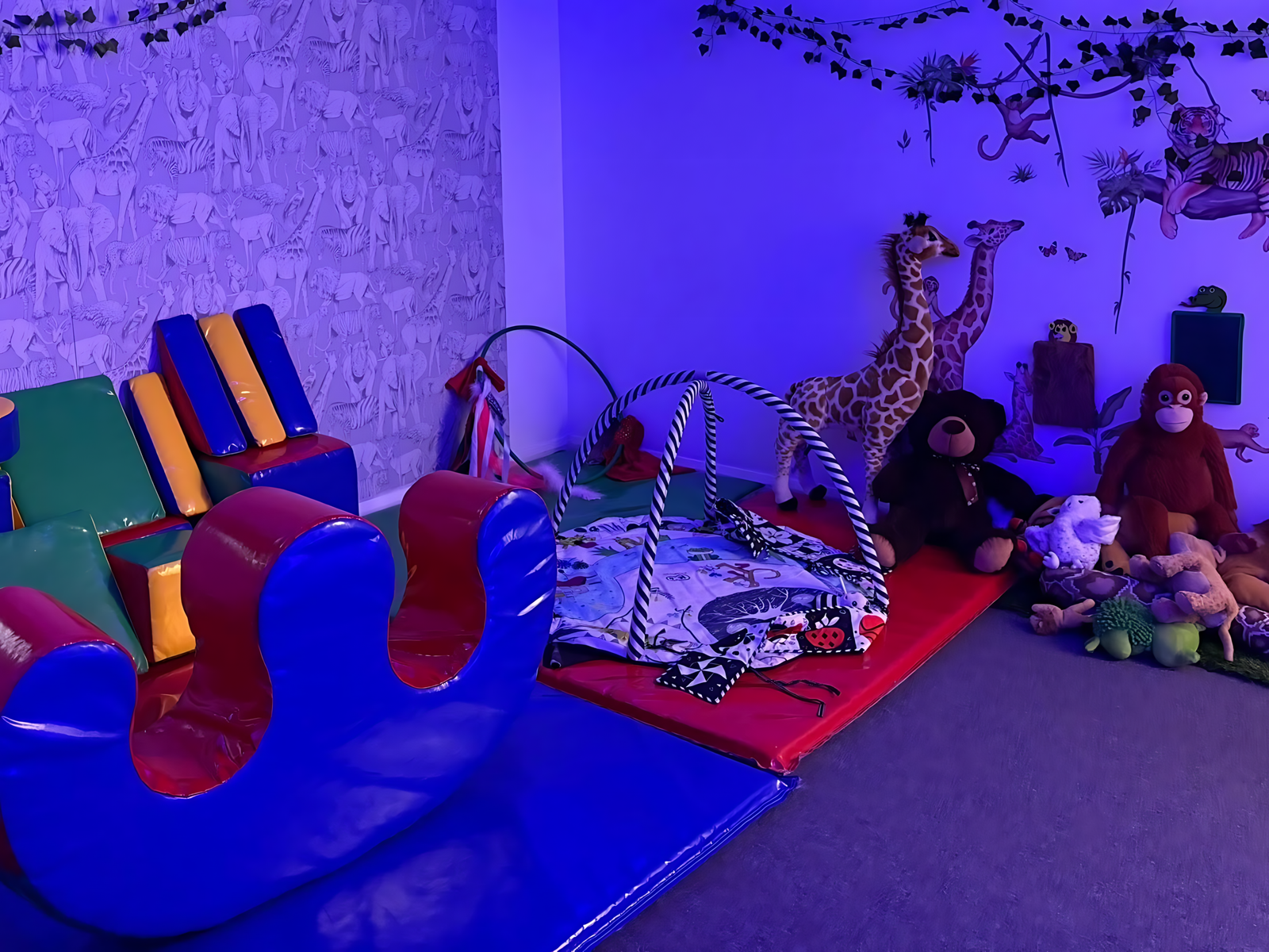 The sensory room, with soft lighting and calming textures.